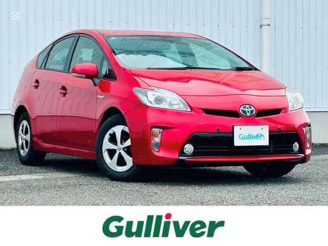 トヨタ プリウス G 熊本県 2014(平26)年 3.4万km レッドマイカメタリック 社外SDナビ（ALPINE）/・AM/FM/CD/DVD/SD/AUX/BT/・フルセグTV/バックカメラ/横滑り防止機能/前後コーナーセンサー/レーダークルーズコントロール/革巻きステアリング/・ステアリングリモコン/電動格納ミラー/・ウィンカーミラー/オートライト/・HIDライト/・フォグランプ/・ヘッドライトレベライザー/ビルトインETC/ハーフレザーシート/・D席パワーシート/車両接近通報装置/踏み間違い加速制御装置/トノカバー/純正フロアマット/スマートキー