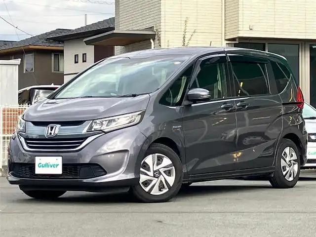 ホンダ フリード＋ ハイブリット G ホンダセンシング 静岡県 2017(平29)年 5.6万km モダンスティールM １オーナー/両側電動スライドドア/純正ナビ/・Bluetooth・DVD/・フルセグTV/・バックカメラ/LEDオートライト/ホンダセンシング/・衝突軽減ブレーキ/・車線維持支援システム/・アダプティブクルーズコントール/前後ドライブレコーダー/フロアマット/ドアバイザー/新車時手帳、取説
