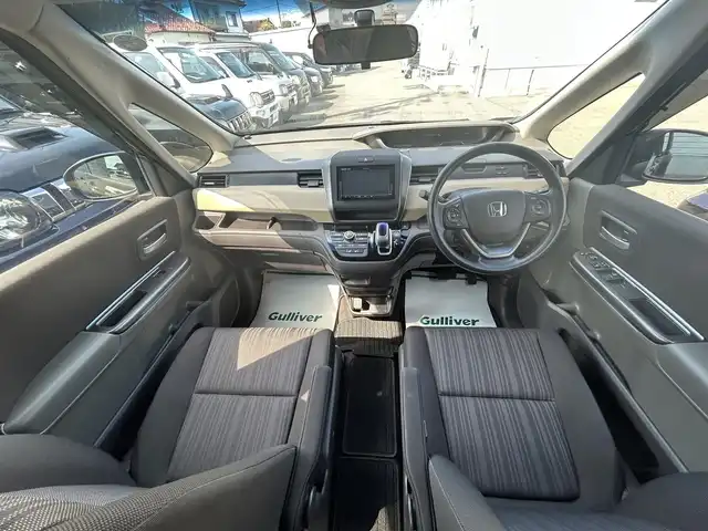 ホンダ フリード ハイブリット G 山形県 2019(令1)年 8.2万km プレミアムスパークルブラックパール ワンオーナー/４WD/衝突被害軽減ブレーキ/左側パワースライドドア/メモリナビ/・CD/DVD/Bluetooth/フルセグ/フリップダウンモニター/エンジンスターター/バックカメラ/ETC/クルーズコントロール/社外15インチAW/シートヒーター/純正フロアマット/LEDオートライト/プッシュスタート/スマートキー/保証書