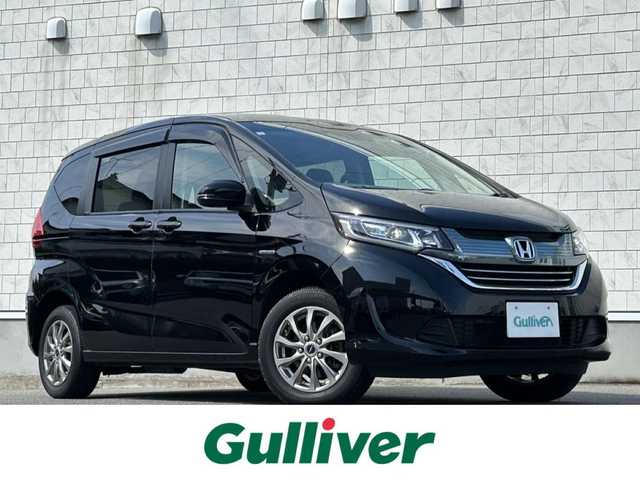 ホンダ フリード ハイブリット G 山形県 2019(令1)年 8.2万km プレミアムスパークルブラックパール ワンオーナー/４WD/衝突被害軽減ブレーキ/左側パワースライドドア/メモリナビ/・CD/DVD/Bluetooth/フルセグ/フリップダウンモニター/エンジンスターター/バックカメラ/ETC/クルーズコントロール/社外15インチAW/シートヒーター/純正フロアマット/LEDオートライト/プッシュスタート/スマートキー/保証書