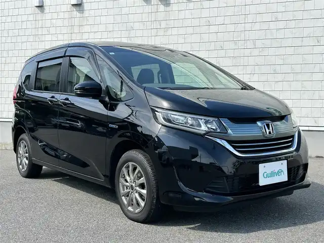 ホンダ フリード ハイブリット G 山形県 2019(令1)年 8.2万km プレミアムスパークルブラックパール ワンオーナー/４WD/衝突被害軽減ブレーキ/左側パワースライドドア/メモリナビ/・CD/DVD/Bluetooth/フルセグ/フリップダウンモニター/エンジンスターター/バックカメラ/ETC/クルーズコントロール/社外15インチAW/シートヒーター/純正フロアマット/LEDオートライト/プッシュスタート/スマートキー/保証書