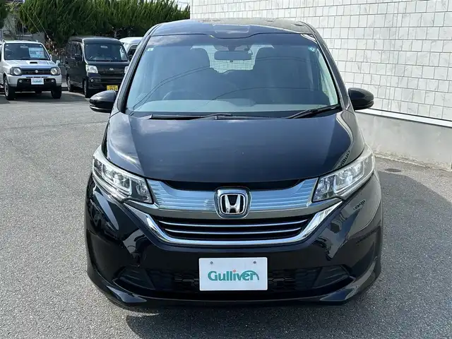 ホンダ フリード ハイブリット G 山形県 2019(令1)年 8.2万km プレミアムスパークルブラックパール ワンオーナー/４WD/衝突被害軽減ブレーキ/左側パワースライドドア/メモリナビ/・CD/DVD/Bluetooth/フルセグ/フリップダウンモニター/エンジンスターター/バックカメラ/ETC/クルーズコントロール/社外15インチAW/シートヒーター/純正フロアマット/LEDオートライト/プッシュスタート/スマートキー/保証書
