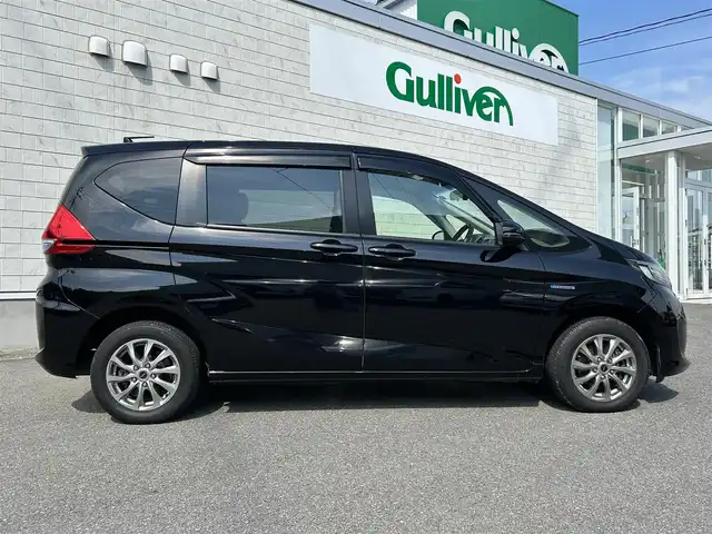 ホンダ フリード ハイブリット G 山形県 2019(令1)年 8.2万km プレミアムスパークルブラックパール ワンオーナー/４WD/衝突被害軽減ブレーキ/左側パワースライドドア/メモリナビ/・CD/DVD/Bluetooth/フルセグ/フリップダウンモニター/エンジンスターター/バックカメラ/ETC/クルーズコントロール/社外15インチAW/シートヒーター/純正フロアマット/LEDオートライト/プッシュスタート/スマートキー/保証書