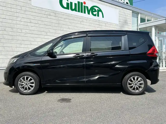 ホンダ フリード ハイブリット G 山形県 2019(令1)年 8.2万km プレミアムスパークルブラックパール ワンオーナー/４WD/衝突被害軽減ブレーキ/左側パワースライドドア/メモリナビ/・CD/DVD/Bluetooth/フルセグ/フリップダウンモニター/エンジンスターター/バックカメラ/ETC/クルーズコントロール/社外15インチAW/シートヒーター/純正フロアマット/LEDオートライト/プッシュスタート/スマートキー/保証書