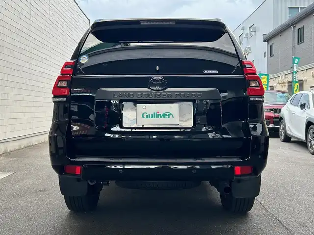 トヨタ ランドクルーザー プラド TX 愛知県 2024(令6)年 1.4万km ブラック ムーンルーフ〈MOP〉/ブラックルーフレール〈MOP〉/クリアランスソナー〈MOP〉/純正9型ディスプレイオーディオ/・Tコネクトナビ／Bluetooth／Miracast/パノラミックビューカメラ/LEDヘッドライト／デイライト／フォグランプ/ヒルスタートアシストコントロール/トラクションコントロール/サイドステップ/リアスポイラー/社外17インチAW〈純正AW積込〉/TOYOTA SAFETY SENSE/・プリクラッシュセーフティ/・レーンディパーチャーアラート/・オートマチックハイビーム/・レーダークルーズコントロール/・ロードサインアシスト/・先行車発進告知/パーキングサポートブレーキ/スマートキー＆プッシュスタート