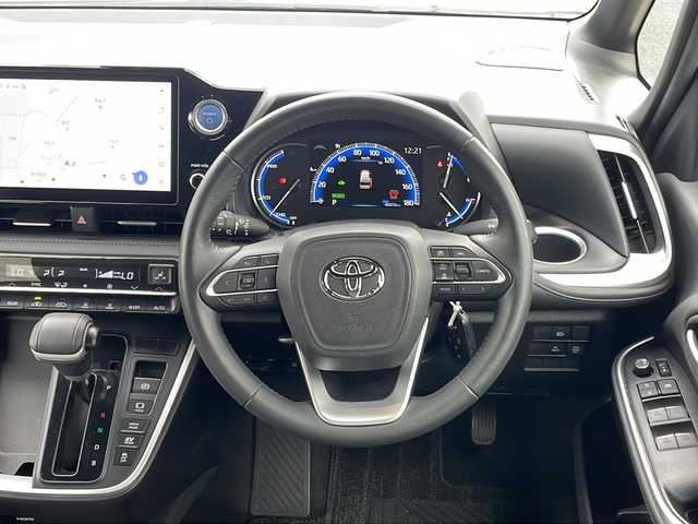 トヨタ ヴォクシー ハイブリッド S－Z 神奈川県 2023(令5)年 4万km ホワイトパールクリスタルシャイン GRエアロ/１０．５型純正ナビ/純正１４型フリップダウンモニター/両側パワースライドドア/ビルトインＥＴＣ２．０/前後ドラレコ/ＴＡＮＡＢＥ製サスペンション/純サス車載/100V充電/LEDライト