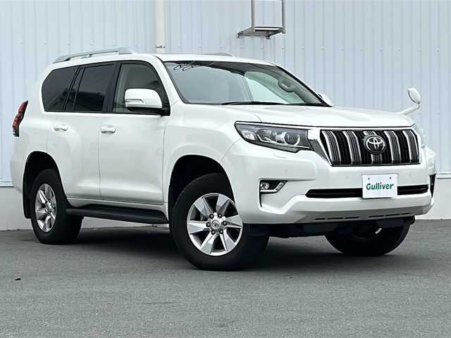 トヨタ ランドクルーザー プラド TX Lパッケージ 三重県 2019(令1)年 4.9万km ホワイトパールクリスタルシャイン 社外９型ナビ　/サンルーフ　/ＡＬＰＩＮＥ後席モニター　/バックカメラ　/ＥＴＣ　/電動格納サードシート　/前席エアーシート /前後コーナーセンサー /レーダークルーズコントロール /レーンキープアシスト/衝突軽減ブレーキ/革巻きステアリング/ステアリングスイッチ/純正フロアマット/LEDヘッドライト/オートハイビーム /オートライト/電動格納ミラー/禁煙車