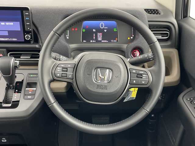 ホンダ フリード ハイブリット e:HEV AIR EX 愛知県 2025(令7)年 0.1千km クリスタルブラックパール 登録済未使用車/6人乗り/純正9インチナビ/（AM/FM/Bluetooth/フルセグTV/USB)/バックカメラ/ホンダセンシング/・衝突軽減ブレーキ/・レーンキープアシスト/・アダプティブクルーズコントロール/・先行車発進お知らせ機能/・オートマチックハイビーム/・パーキングセンサーシステム/・ブラインドスポットモニター/ハーフレザーシート/シートヒーター/両側パワースライドドア/アイドリングストップ/純正15インチアルミホイール/スマートキー/スペアキー1本/プッシュスタート/LEDヘッドライト/横滑り防止装置