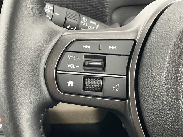 ホンダ フリード ハイブリット e:HEV AIR EX 愛知県 2025(令7)年 0.1千km クリスタルブラックパール 登録済未使用車/6人乗り/純正9インチナビ/（AM/FM/Bluetooth/フルセグTV/USB)/バックカメラ/ホンダセンシング/・衝突軽減ブレーキ/・レーンキープアシスト/・アダプティブクルーズコントロール/・先行車発進お知らせ機能/・オートマチックハイビーム/・パーキングセンサーシステム/・ブラインドスポットモニター/ハーフレザーシート/シートヒーター/両側パワースライドドア/アイドリングストップ/純正15インチアルミホイール/スマートキー/スペアキー1本/プッシュスタート/LEDヘッドライト/横滑り防止装置