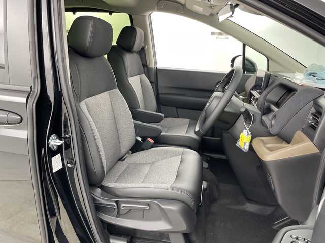 ホンダ フリード ハイブリット e:HEV AIR EX 愛知県 2025(令7)年 0.1千km クリスタルブラックパール 登録済未使用車/6人乗り/純正9インチナビ/（AM/FM/Bluetooth/フルセグTV/USB)/バックカメラ/ホンダセンシング/・衝突軽減ブレーキ/・レーンキープアシスト/・アダプティブクルーズコントロール/・先行車発進お知らせ機能/・オートマチックハイビーム/・パーキングセンサーシステム/・ブラインドスポットモニター/ハーフレザーシート/シートヒーター/両側パワースライドドア/アイドリングストップ/純正15インチアルミホイール/スマートキー/スペアキー1本/プッシュスタート/LEDヘッドライト/横滑り防止装置