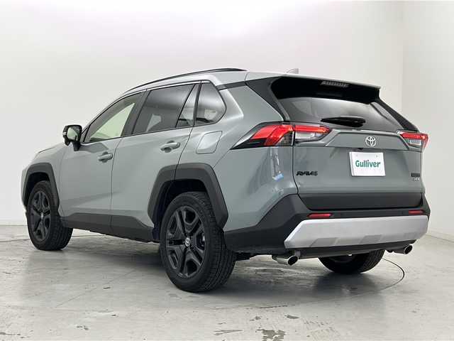 トヨタ ＲＡＶ４ ハイブリッド アドベンチャー 宮城県 2025(令7)年 1.8万km アッシュグレーメタリック/アーバンカーキ 禁煙車/サンルーフ/４ＷＤ/寒冷地仕様/・リアフォグランプ・タイマー付ウインドシールドデアイサー/Toyota Safety Sense	/・プリクラッシュセーフティ/・レーントレーシングアシスト		/・レーダークルーズコントロール/・オートマチックハイビーム/ブラインドスポットモニター（ＢＳＭ）/パワーシート/シートメモリー/シートヒーター/ベンチレーション/レザーシート/純正ディスプレイオーディオ/・BT.USB.MiraCast/フルセグ/バックカメラ/ビルトインETC2.0/LEDヘッドライト/フォグランプ/革巻きステアリング/ステアリングスイッチ/純正フロアマッド/プッシュスタート/横滑り防止機能