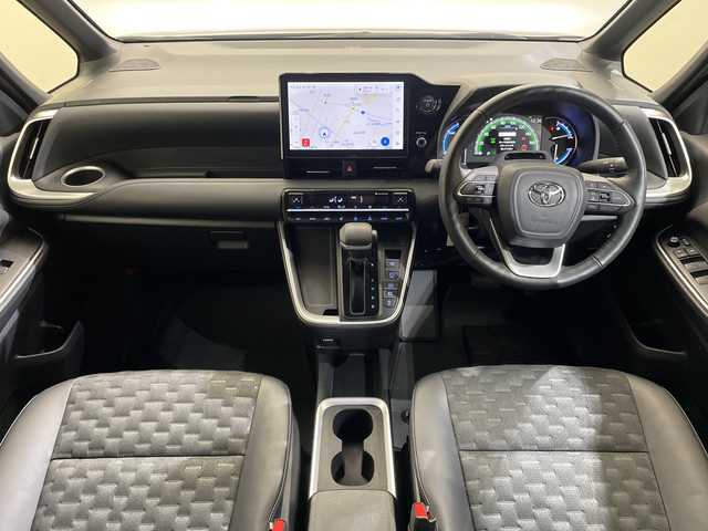 トヨタ ヴォクシー ハイブリッド S－Z 愛媛県 2023(令5)年 2.7万km アティチュードブラックマイカ 快適利便パッケージ(High)/純正14インチ後席モニター　/CD・DVDデッキ　/ブラインドスポットモニター　/______________________/純正１０型ナビ／純正１４型フリップダウンモニター／快適利便／ブラインドスポットモニター／両側電動スライドドア／電動リアゲート／衝突被害軽減ブレーキ／シートヒーター／ＴＶ／Ｂｌｕｅｔｏｏｔｈ／禁煙