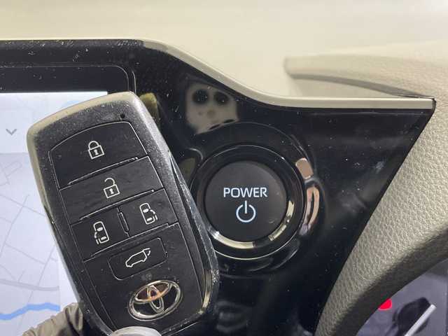 トヨタ ヴォクシー ハイブリッド S－Z 愛媛県 2023(令5)年 2.7万km アティチュードブラックマイカ 快適利便パッケージ(High)/純正14インチ後席モニター　/CD・DVDデッキ　/ブラインドスポットモニター　/______________________/純正１０型ナビ／純正１４型フリップダウンモニター／快適利便／ブラインドスポットモニター／両側電動スライドドア／電動リアゲート／衝突被害軽減ブレーキ／シートヒーター／ＴＶ／Ｂｌｕｅｔｏｏｔｈ／禁煙