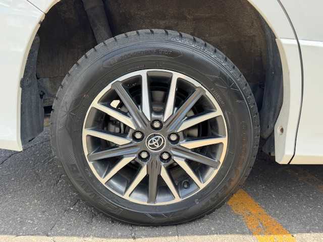 トヨタ ヴォクシー ZS 道東・釧路十勝 2014(平26)年 7.6万km ホワイトパールクリスタルシャイン 4WD/7人乗り/寒冷地仕様/純正9インチメモリーナビ/  (DVD/CD/フルセグTV/Bluetooth)/バックカメラ/純正フリップダウンモニター/両側パワースライドドア/LEDヘッドライト/フォグライト/革巻きステアリング/ステアリングリモコン/アイドリングストップ/ドライブレコーダー/ウィンカーミラー/電動格納ミラー/フロントワイパーデアイサー/ビルトインETC/運転席シートリフター/純正ドアバイザー/純正フロアマット/純正キーレス一体型エンジンスターター/ディーラー記録簿 R1/2/3/4/5/スマートキー/エンジンプッシュスタート/スペアキー/取扱説明書/保証書/ナビ取説/純正16インチアルミホイール