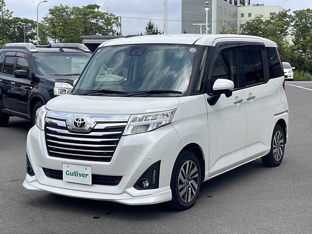トヨタ ルーミー カスタムG 青森県 2020(令2)年 2.7万km パールホワイトⅢ ・ワンオーナー/・寒冷地仕様/・４ＷＤ/・アルパイン９型メモリーナビ（Ｘ９ＮＸ）/・フルセグＴＶ/・バックカメラ/・スマートアシストIII/・レーンキープアシスト/・レーダークルーズコントロール/・ワイパーデアイサー/・社外前後ドライブレコーダー/・社外ＥＴＣ/・純正フロントリップスポイラー/・横滑り防止装置/・ＬＥＤヘッドライト/・ＬＥＤフォグランプ/・オートハイビーム/・オートライト/・ドアバイザー/・純正フロアマット/・シートヒーター/・純正１４インチＡＷ/・１６５／６５Ｒ１４スタッドレス純正ＡＷ別積み/・保証書/・取扱説明書