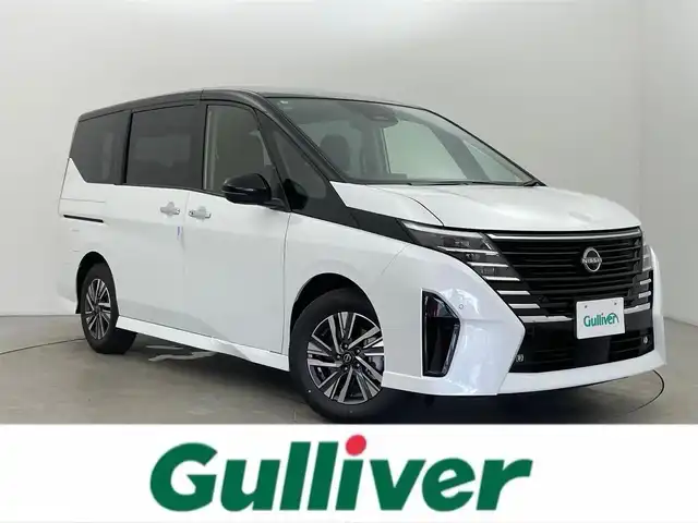 日産 セレナ e－パワー ハイウェイスター V 富山県 2025(令7)年 0.1千km 白Ⅱ 純正12.3型ナビ（AM/FM/BT/USB/HDMI/フルセグ）/全方位カメラ/純正後席モニター/ETC/両側パワースライドドア/デジタルインナーミラー/オートホールド付電子パーキング/ブラインドスポットモニター/衝突被害軽減システム/レーダークルーズコントロール/レーンキープアシスト/コーナーセンサー/横滑り防止装置/アイドリングストップ/純正アルミホイール/オートLEDライト/オートマチックハイビーム/革巻きステアリング/ステアリングスイッチ