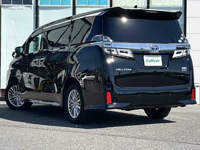 トヨタ ヴェルファイア ハイブリット ZR 山形県 2019(令1)年 4.8万km ブラック 禁煙車/4WD/トヨタセーフティーセンス/レーダークルーズコントロール/両側パワースライドドア/前後コーナーセンサー/前後ドライブレコーダー/バックカメラ/純正ナビ/（Bluetooth/CD/DVD/フルセグ)/フリップダウンモニター/電動リアゲート/LEDオートライト/フォグランプ/レザーシート/前席パワーシート/メモリーシート/前席シートヒーター/前席エアシート/オットマン/ステアリングスイッチ/電動パーキングブレーキ/オートブレーキホールド/ビルトインETC2.0/純正AW/純正フロアマット/スマートキー×2/電動格納ウィンカーミラー/ドアバイザー