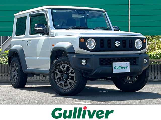 スズキ ジムニー シエラ JC 茨城県 2020(令2)年 5.2万km ピュアホワイトP 社外８インチSDナビ/-フルセグTV Bluetooth CD DVD/バックカメラ/４WD/クルーズコントロール/横滑り防止装置/ダウンヒルアシストコントロール/衝突被害軽減システム/ドライビングセーフティセンサー/LEDオートライト/前席シートヒーター/ステアリングスイッチ/背面タイヤ/純正１５インチアルミホイール/藤壺マフラー/前後社外ドライブレコーダー/スペア付きスマートキー/ETC