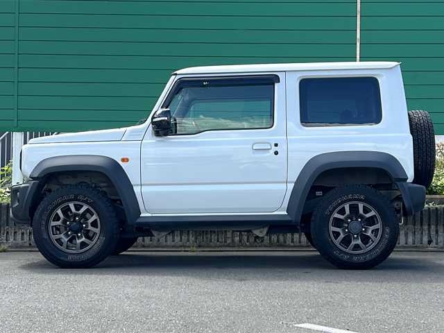 スズキ ジムニー シエラ JC 茨城県 2020(令2)年 5.2万km ピュアホワイトP 社外８インチSDナビ/-フルセグTV Bluetooth CD DVD/バックカメラ/４WD/クルーズコントロール/横滑り防止装置/ダウンヒルアシストコントロール/衝突被害軽減システム/ドライビングセーフティセンサー/LEDオートライト/前席シートヒーター/ステアリングスイッチ/背面タイヤ/純正１５インチアルミホイール/藤壺マフラー/前後社外ドライブレコーダー/スペア付きスマートキー/ETC