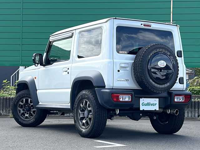 スズキ ジムニー シエラ JC 茨城県 2020(令2)年 5.2万km ピュアホワイトP 社外８インチSDナビ/-フルセグTV Bluetooth CD DVD/バックカメラ/４WD/クルーズコントロール/横滑り防止装置/ダウンヒルアシストコントロール/衝突被害軽減システム/ドライビングセーフティセンサー/LEDオートライト/前席シートヒーター/ステアリングスイッチ/背面タイヤ/純正１５インチアルミホイール/藤壺マフラー/前後社外ドライブレコーダー/スペア付きスマートキー/ETC