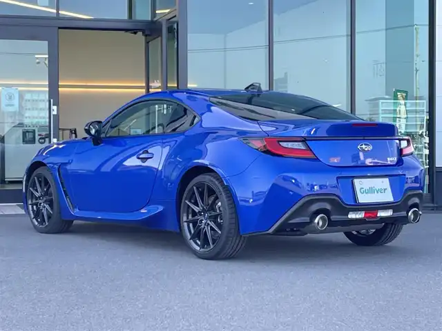 スバル ＢＲＺ STIスポーツ 東京都 2023(令5)年 1.1万km WRブルーパール 6速MT/社外ナビ/フルセグ/ETC/シートヒーター/アイサイト/プリクラッシュブレーキ/車線逸脱警報/レーダークルーズコントロール/LEDヘッドライト/スマートキー/純正18インチAW/ステアリングスイッチ/保証書