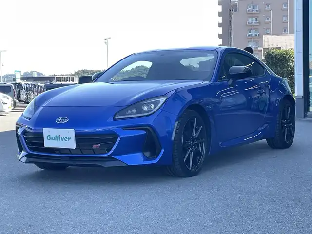 スバル ＢＲＺ STIスポーツ 東京都 2023(令5)年 1.1万km WRブルーパール 6速MT/社外ナビ/フルセグ/ETC/シートヒーター/アイサイト/プリクラッシュブレーキ/車線逸脱警報/レーダークルーズコントロール/LEDヘッドライト/スマートキー/純正18インチAW/ステアリングスイッチ/保証書