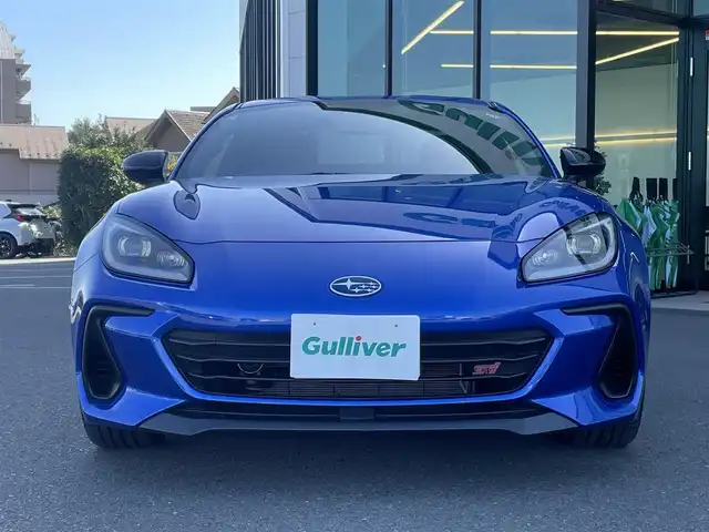 スバル ＢＲＺ STIスポーツ 東京都 2023(令5)年 1.1万km WRブルーパール 6速MT/社外ナビ/フルセグ/ETC/シートヒーター/アイサイト/プリクラッシュブレーキ/車線逸脱警報/レーダークルーズコントロール/LEDヘッドライト/スマートキー/純正18インチAW/ステアリングスイッチ/保証書