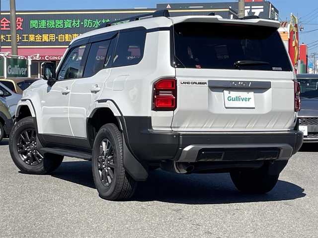 トヨタ ランドクルーザー ２５０ VX 愛知県 2024(令6)年 0.1千km プラチナホワイトパールマイカ /禁煙車//ワンオーナー//サンルーフ//モデリスタパッケージ//モデリスタオーバーフェンダー//モデリスタリアスポイラー//モデリスタリヤバンパーステップガード//モデリスタシグネチャーイルミブレード//モデリスタLEDスマートフットライト//12.3インチディスプレイオーディオ//フルセグTV/BT/USB/Miracast//パノラミックビューモニター//黒革シート//エアシート//シートヒーター//パワーシート//ETC2.0//デジタルインナーミラー//パワーバックドア//ルーフレール//サイドステップ//MTモード付AT//純正ドライブレコーダー//PCS/LDA/BSM/PDA/RSA/ACC/RCTA/RCD/クリアランスソナー/安心降車アシスト/後方車両接近検知//オートリトラウィンカーミラー//LEDオートライト//オートハイビーム//ヘッドライトウォッシャー//純正フロアマット//純正ドアバイザー//純正トノカバー//純正ラゲージソフトトレイ//プロジェクションカーテンイルミ//ドアエッジプロテクター//革巻きステアリング//ステアリングスイッチ//ステアリングヒーター//エアコンドリンクホルダー//GPSレーダー探知機//スペアスマートキー//新車時保証書//取扱説明書