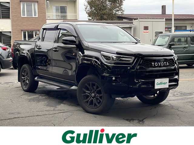 トヨタ ハイラックス Z GRスポーツ 道東・釧路十勝 2021(令3)年 4.6万km アティチュードブラックマイカ パートタイム4WDシステム/寒冷地仕様/純正ナビ/  （Bluetooth）/全方位カメラ/プリクラッシュセーフティ/レーンディパーチャーアラート/レーダークルーズコントロール/ロードサインアシスト（RSA）/先行車発進告知機能（TMN）/ヒルスタートアシストコントロール（HAC）/LEDヘッドライト/LEDフォグライト/フロントワイパーデアイサ―/ミラーヒーター/リヤフォグライト/パワーシート/ハーフレザーシート/コーナーセンサー/アイドリングストップ/ステアリングリモコン/革巻きステアリング/パドルシフト/横滑り防止装置/リヤデフロック/USBソケット/ETC/ドアバイザー/社外フロアマット/スペアタイヤ/社外マフラー（JAOS/BATTLEZ）/KYBリフトアップキット（１インチ）/リヤ三面スモーク施工/純正エンジンスターター/スマートキー/エンジンプッシュスタート/スペアキー/取扱説明書/保証書/ナビ取説/純正18インチアルミホイール