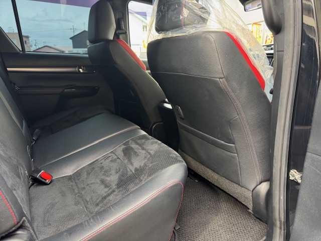 トヨタ ハイラックス Z GRスポーツ 道東・釧路十勝 2021(令3)年 4.6万km アティチュードブラックマイカ パートタイム4WDシステム/寒冷地仕様/純正ナビ/  （Bluetooth）/全方位カメラ/プリクラッシュセーフティ/レーンディパーチャーアラート/レーダークルーズコントロール/ロードサインアシスト（RSA）/先行車発進告知機能（TMN）/ヒルスタートアシストコントロール（HAC）/LEDヘッドライト/LEDフォグライト/フロントワイパーデアイサ―/ミラーヒーター/リヤフォグライト/パワーシート/ハーフレザーシート/コーナーセンサー/アイドリングストップ/ステアリングリモコン/革巻きステアリング/パドルシフト/横滑り防止装置/リヤデフロック/USBソケット/ETC/ドアバイザー/社外フロアマット/スペアタイヤ/社外マフラー（JAOS/BATTLEZ）/KYBリフトアップキット（１インチ）/リヤ三面スモーク施工/純正エンジンスターター/スマートキー/エンジンプッシュスタート/スペアキー/取扱説明書/保証書/ナビ取説/純正18インチアルミホイール