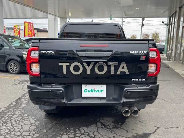 トヨタ ハイラックス Z GRスポーツ 道東・釧路十勝 2021(令3)年 4.6万km アティチュードブラックマイカ パートタイム4WDシステム/寒冷地仕様/純正ナビ/  （Bluetooth）/全方位カメラ/プリクラッシュセーフティ/レーンディパーチャーアラート/レーダークルーズコントロール/ロードサインアシスト（RSA）/先行車発進告知機能（TMN）/ヒルスタートアシストコントロール（HAC）/LEDヘッドライト/LEDフォグライト/フロントワイパーデアイサ―/ミラーヒーター/リヤフォグライト/パワーシート/ハーフレザーシート/コーナーセンサー/アイドリングストップ/ステアリングリモコン/革巻きステアリング/パドルシフト/横滑り防止装置/リヤデフロック/USBソケット/ETC/ドアバイザー/社外フロアマット/スペアタイヤ/社外マフラー（JAOS/BATTLEZ）/KYBリフトアップキット（１インチ）/リヤ三面スモーク施工/純正エンジンスターター/スマートキー/エンジンプッシュスタート/スペアキー/取扱説明書/保証書/ナビ取説/純正18インチアルミホイール