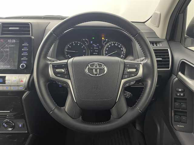 トヨタ ランドクルーザー プラド TX Lパッケージ ブラックED 道央・札幌 2020(令2)年 1.8万km ホワイトパールクリスタルシャイン ・４WD/・ワンオーナー/・MOPナビ/　Miracast/BT/USB/・ステアリングスイッチ/・マルチテレインモニター/・ビルトインETC2.0/・ドライブレコーダー前後（ZDR016）/・トヨタセーフティセンス/　PCS/LDA/RSA/　ソナー/先行車発進告知/・アダプティブクルーズコントロール/・横滑り防止装置/・ABS/・オートマチックハイビーム/・オートライト/・LEDヘッドライト/・LEDフォグランプ/・ミラーウィンカー/・オートリトラクタブルドアミラー/・ヘッドランプウォッシャー/・自動防眩式ルームミラー/・社外フロアマット/・純正１８インチAW/・プッシュスタート/・スマートキー/・スペアキー/・取/保