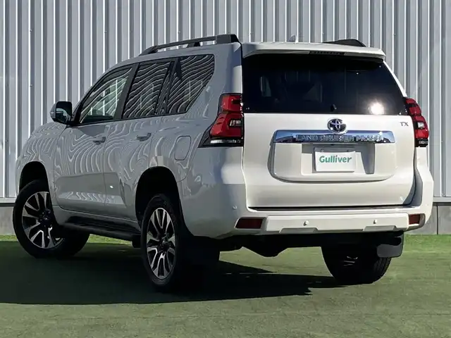 トヨタ ランドクルーザー プラド TX Lパッケージ 香川県 2022(令4)年 3万km ホワイトパールクリスタルシャイン 登録時走行距離：29532km/メーカー純正9型ナビ/　BT接続 フルセグTV/パノラミックビューモニター/プリクラッシュセーフティシステム/レーダークルーズコントロール/レーンキープアシスト/クリアランスソナー/ブラインドスポットモニター/オートハイビーム/LEDヘッドライト/オートライト/フォグランプ/ヘッドライトウォッシャー/ルーフレール/ベージュレザーシート/シートヒーター/エアシート/パワーシート/ビルトインETC2.0/プッシュスタート/スマートキー