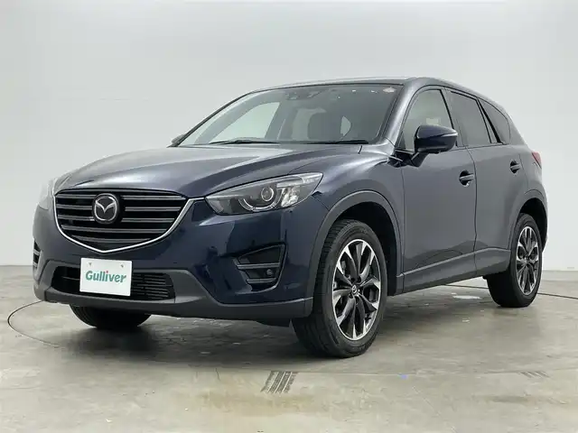 マツダ ＣＸ－５ XD Lパッケージ 岡山県 2015(平27)年 6.7万km ディープクリスタルブルーマイカ 純正ナビ/(Bluetooth/CD/DVD/フルセグTV/AUX)/本革シート/シートヒーター(運転席・助手席)/シートメモリ/レーダークルーズコントロール/オートハイビーム/LEDヘッドライト/バックカメラ/スマートキー(2本)/コーナーセンサー(後)/ビルトインETC/社外ドライブレコーダー(前後)/純正フロアマット/純正19インチアルミホイール