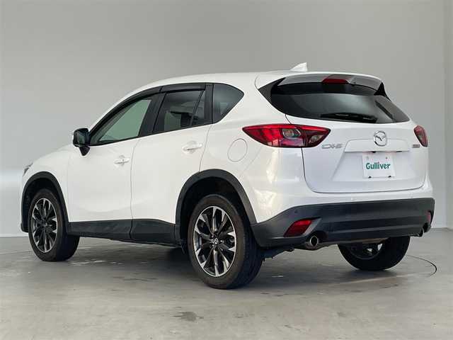 マツダ ＣＸ－５ XD Lパッケージ 埼玉県 2015(平27)年 6万km クリスタルホワイトパールマイカ 純正マルチナビ/・(CD/DVD/AM/FM/DTV/BT)/i-ACTIVSENSE/・ブラインドスポットモニタリング/・スマートシティブレーキ/・レーダークルーズコントロール/バックカメラ/クルーズコントロール/全席レザーシート/前席シートヒーター/前後ドライブレコーダー/前席パワーシート/D席メモリーシート/ETC/純正19インチAW/コーナーセンサー/スペアキーX1/保証書・取説