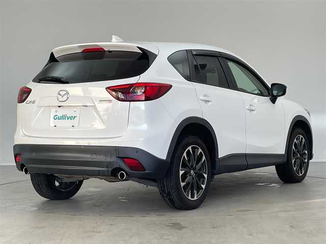 マツダ ＣＸ－５ XD Lパッケージ 埼玉県 2015(平27)年 6万km クリスタルホワイトパールマイカ 純正マルチナビ/・(CD/DVD/AM/FM/DTV/BT)/i-ACTIVSENSE/・ブラインドスポットモニタリング/・スマートシティブレーキ/・レーダークルーズコントロール/バックカメラ/クルーズコントロール/全席レザーシート/前席シートヒーター/前後ドライブレコーダー/前席パワーシート/D席メモリーシート/ETC/純正19インチAW/コーナーセンサー/スペアキーX1/保証書・取説