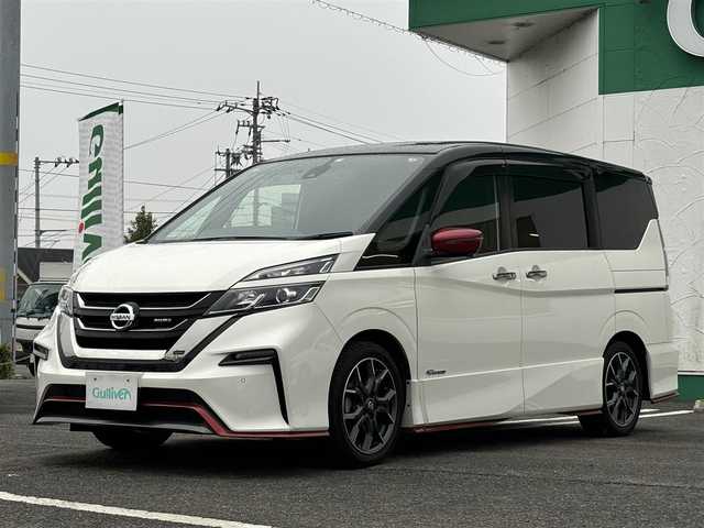 日産 セレナ ニスモ 福岡県 2018(平30)年 7.9万km ブリリアントホワイトパール 2トーン 純正9型ナビゲーション/フルセグTV/CD/DVD/Blue-ray/SDREC/Bluetooth）/プロパイロット/専用バンパースポイラー＆サイド＆リヤバンパースポイラー/インテリジェントアラウンドビューモニター/パーキングアシスト/ビルトインETC/ドライブレコーダー/全方位運転支援システム/トラクションコントロール/ハンズフリーパワースライドドア/インテリジェントエマージェンシーブレーキ/LEDヘッドランプ/オートライト/ウィンカーミラー/純正17インチアルミ/革/アルカンターラステアリング/アルカンターラシート/オートエアコン/リヤオートエアコン/電動パーキングブレーキ/オートブレーキホールド/インテリジェントキー/禁煙車/専用フロアマット/サイドバイザー