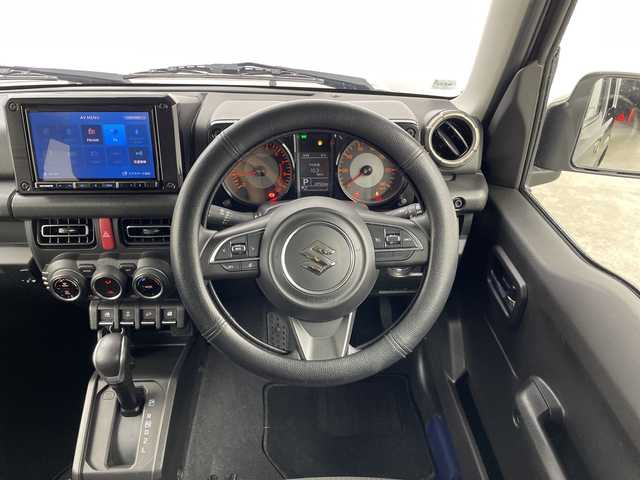 スズキ ジムニー XC 群馬県 2023(令5)年 2.5万km ブルーイッシュブラックパール3 ４ＷＤターボ　ナビ　フルセグＴＶ　ＥＴＣ　衝突被害軽減ブレーキ　レーンアシスト　クルーズコントロール　ＬＥＤヘッドライト　オートライト　シートヒーター　スマートキー　純正アルミホイール　禁煙車