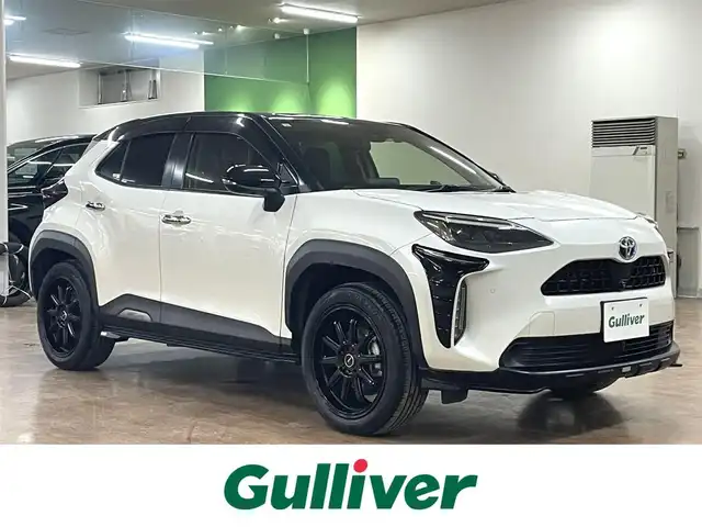 トヨタ ヤリスクロス ハイブリッド Z 道央・札幌 2021(令3)年 2.1万km ブラックマイカ/ホワイトパールクリスタルシャイン 2トーン ワンオーナー/4WD/寒冷地仕様/TOM’Sエアロ（フロント/サイド/リア）/5ZIGEN 18インチAW/純正T-Connectナビ/フルセグTV/Bluetooth/Miracast/全方位カメラ/トヨタセーフティセンス/プリクラッシュセーフティ/レーントレーシングアシスト/ロードサインアシスト/レーダークルーズコントロール/先行車発進告知機能/ブラインドスポットモニター/フロントワイパーダイサー/オートマチックハイビーム/ヘッドライトレベライザー/クリアランスソナー/リヤクロストラフィックアラート/パーキングサポートブレーキ/ドライブセレクトスイッチ/トレイル/スノーモード/ダウンヒルアシストコントロール/パワーバックドア/運転席パワーシート/ハーフレザーシート/前席シートヒーター/ステアリングヒーター/LEDヘッドライト/デイライト/純正ドライブレコーダー/ETC2.0/スマートキー×2/AC100V電源/2.1A USB/純正AW付スタッドレスセット積込み/　（215/50/18 BS VRX3 2021年製6mm）/保証書/取扱説明書