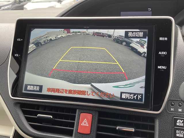 トヨタ ノア ハイブリッド Si ダブルバイビー 茨城県 2018(平30)年 7.7万km ラグジュアリーホワイトパールクリスタルシャインガラスフレーク 純正10inメモリナビ【NSZN-Z66T】/(地デジTV・CD・DVD・BT・USB・ラジオ再生・HDMI端子)/両側パワースライドドア/純正12inフリップダウンモニター/クルーズコントロール/衝突軽減ブレーキ/革調シートカバー/コーナーセンサー/バックカメラ/ETC/前後ドライブレコーダー/オートライト/LEDヘッドライト/純正16inアルミホイール/純正フロアマット/スマートキー/取扱説明書