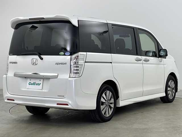 ホンダ ステップワゴン スパーダ Z 道央・札幌 2014(平26)年 11万km ホワイトオーキッドパール ・4WD/・純正SDナビ&フルセグ&CD&DVD&MSV&BT/・バックカメラ/・両側パワースライドドア/・クルーズコントロール/・社外ドライブレコーダー/・社外エンジンスターター/・社外レーダー/・純正フロアマット/・社外16インチAW付スタッドレス積込/・純正16インチAW/・パドルシフト/・革巻きステアリング/・ステアリングスイッチ/・フロントワイパーデアイサー/・オートライト/・HIDヘッドライト/・フォグランプ/・スマートキー/・スペアキー/・アイドリングストップ