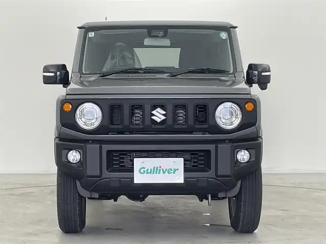 スズキ ジムニー XC 群馬県 2024(令6)年 0.1万km未満 ミディアムグレー 届出済未使用車(登録時走行距離:8km)/社外７インチナビ/シートヒーター/スズキセーフティサポート/・デュアルセンサーブレーキサポート/・車線逸脱警報機能/・ふらつき警報機能/・先行車発進お知らせ機能/・ハイビームアシスト/・標識認識/・クルーズコントロール/・LEDヘッドランプ
