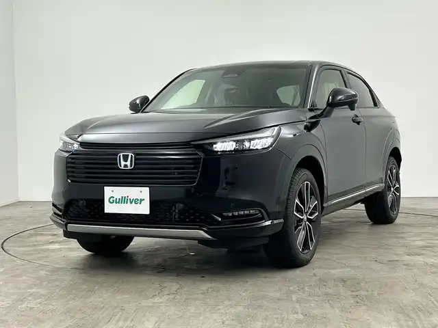 ホンダ ヴェゼル ハイブリッド e:HEV Z 三重県 2025(令7)年 0.1千km クリスタルブラックパール 登録済未使用車/純正ナビ/・AM/FM/Bluetooth/フルセグ/AndroidAuto/AppleCarPray/USB/ホンダセンシング/・ブラインドスポットインフォメーション/・車線逸脱/・衝突軽減ブレーキ/・アダプティブクルーズコントロール/前席シートヒーター/ステアリングヒーター/パワーバックドア/パドルシフト/ワイヤレスチャージャー/ETC2.0/LEDヘッドライト/ヒルディセントコントロール/電動パーキング/ハーフレザーシート/純正18インチAW