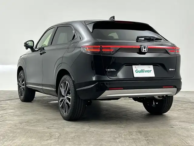 ホンダ ヴェゼル ハイブリッド e:HEV Z 三重県 2025(令7)年 0.1千km クリスタルブラックパール 登録済未使用車/純正ナビ/・AM/FM/Bluetooth/フルセグ/AndroidAuto/AppleCarPray/USB/ホンダセンシング/・ブラインドスポットインフォメーション/・車線逸脱/・衝突軽減ブレーキ/・アダプティブクルーズコントロール/前席シートヒーター/ステアリングヒーター/パワーバックドア/パドルシフト/ワイヤレスチャージャー/ETC2.0/LEDヘッドライト/ヒルディセントコントロール/電動パーキング/ハーフレザーシート/純正18インチAW