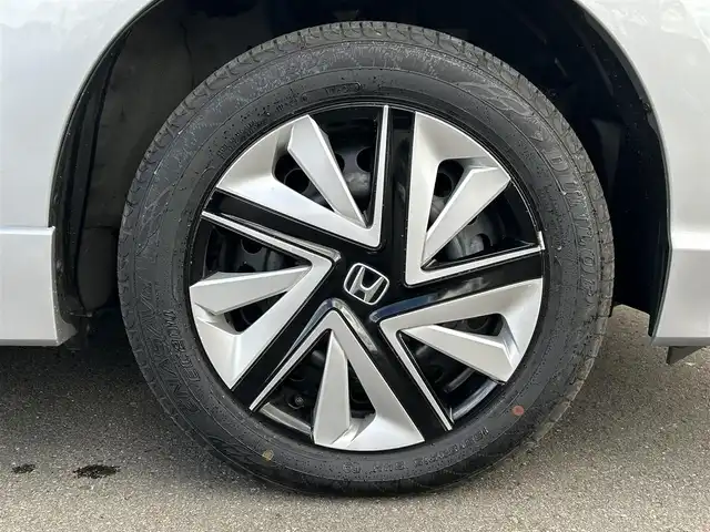 ホンダ シャトル ハイブリッド ホンダセンシング 道央・札幌 2022(令4)年 7.9万km ルナシルバーM ・4WD/・社外SDナビ（BT）/・ドアバイザー/・電動格納ミラー/・ウインカーミラー/・バックモニター/・前方ドライブレコーダー/・スマートキー/・クルーズコントロール/・プッシュスタート/・レーンキープアシスト/・ETC/・オートライト/・社外ドライブレコーダー
