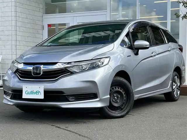 ホンダ シャトル ハイブリッド ホンダセンシング 道央・札幌 2022(令4)年 7.9万km ルナシルバーM ・4WD/・社外SDナビ（BT）/・ドアバイザー/・電動格納ミラー/・ウインカーミラー/・バックモニター/・前方ドライブレコーダー/・スマートキー/・クルーズコントロール/・プッシュスタート/・レーンキープアシスト/・ETC/・オートライト/・社外ドライブレコーダー