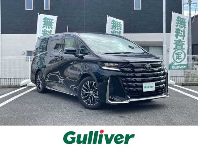 トヨタ ヴェルファイア ハイブリット Z プレミア 三重県 2023(令5)年 1.9万km ブラック 登録時18892km/ワンオーナー/禁煙車/純正T-connectナビ/・Ｂｌｕｅｔｏｏｔｈ・フルセグ・carplay・Miracast・AM/FM/トヨタセーフティセンスシステム/・プリクラッシュセーフティシステム/・フロントクロストラフィックアラート/・ブラインドスポットモニター/・プロアクティブドライビングアシスト/・レーンディパーチャーアラート/・レーダークルーズコントロール/・前後コーナーセンサー/全席シートヒーター・ベンチレーション/全席パワーシート/ワイヤレス充電/純正フリップダウン/前後ドラレコ/左右独立ムーンルーフ/パーキングアシスト/ヘッドアップディスプレイ/AUTOライト・ハイビーム・ワイパー/デジタルインナーミラー/パドルシフト/両側パワースライドドア/三眼LEDヘッドライト/ビルドインETC2.0