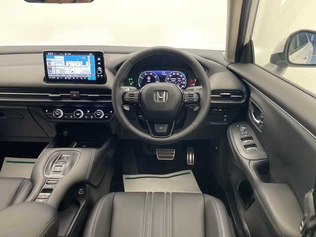 ホンダ ＺＲ－Ｖ ハイブリッド e:HEV Z 宮崎県 2022(令4)年 0.1千km プラチナホワイトパール Honda SENSING/〇衝突軽減ブレーキ（CMBS）/〇先行車発進お知らせ機能/〇歩行者事故低減ステアリング/〇路外逸脱抑制機能/〇標識認識機能/〇渋滞追従機能付アダプティブクルーズコントロール（ACC）/〇車線維持支援システム（LKAS）/〇トラフィックジャムアシスト（渋滞運転支援機能）/〇ブラインドスポットインフォメーション/〇誤発進抑制機能/〇後方誤発進抑制機能/〇近距離衝突軽減ブレーキ/〇パーキングセンサーシステム/〇後退出庫サポート/〇オートハイビーム/〇アダプティブドライビングビーム/BOSEプレミアムサウンドシステム(12スピーカー)/純正9インチナビ/フルセグTV/マルチビューカメラシステム/黒レザーシート/パワーシート/シートヒーター/ステアリングヒーター/パドルシフト/ハンズフリーアクセスパワーテールゲート(予約クローズ機能付)/ワイヤレス充電/ビルトインETC2.0/LEDヘッドライト/純正18インチAW