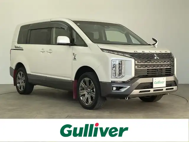 三菱 デリカＤ：５ ジャスパー 大分県 2021(令3)年 5万km パール 4WD/純正10.1型ナビ/　BT/CD/DVD/フルセグ/純正フリップダウンモニター/レーダークルーズコントロール/両側パワースライドドア/バックカメラ/オートブレーキホールド/撥水機能付きハーフレザーシート/オートマチックハイビーム/LEDヘッドライト/ステアリングリモコン/革巻ステアリング/チップアップシート/フルフラットシート/純正アルミホイル18インチ/純正フロアマット/MTモード