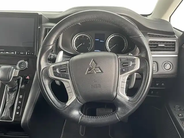 三菱 デリカＤ：５ ジャスパー 大分県 2021(令3)年 5万km パール 4WD/純正10.1型ナビ/　BT/CD/DVD/フルセグ/純正フリップダウンモニター/レーダークルーズコントロール/両側パワースライドドア/バックカメラ/オートブレーキホールド/撥水機能付きハーフレザーシート/オートマチックハイビーム/LEDヘッドライト/ステアリングリモコン/革巻ステアリング/チップアップシート/フルフラットシート/純正アルミホイル18インチ/純正フロアマット/MTモード